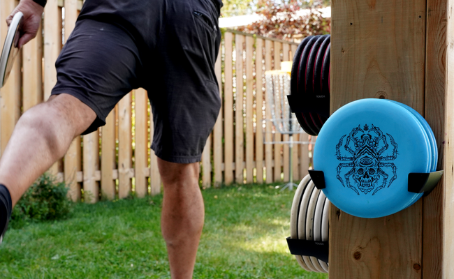 Transform Your Backyard into a Disc Golf Haven with a Wall Disc Holder